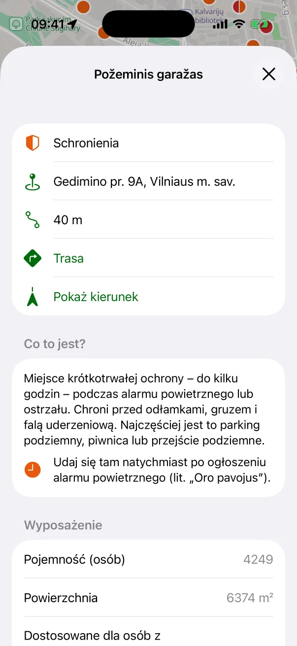 Karta schronienia z przyciskami trasy i kierunku